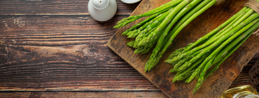 Fresh Green Asparagus On Wooden Background